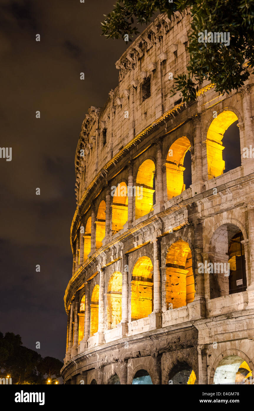 Colosseum of Rome at night with nice cloudy sky in background Stock ...