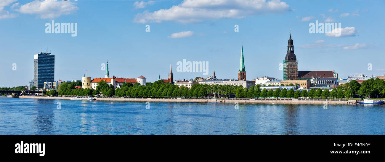 Panorama of Riga over Daugava river: Riga Castle, St. James's Cathedral, Riga Cathedral, St. Peter's Church Stock Photo
