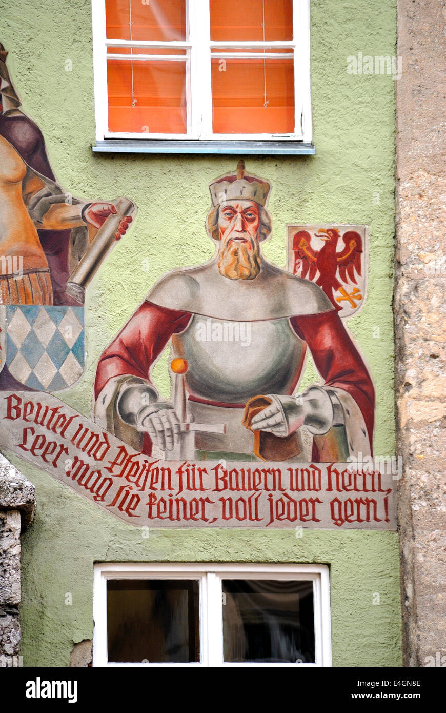 Innsbruck, Tirol, Austria. Painted House facade in Herzog Friedrich Strasse - seller of Pipes and Leather Goods Stock Photo