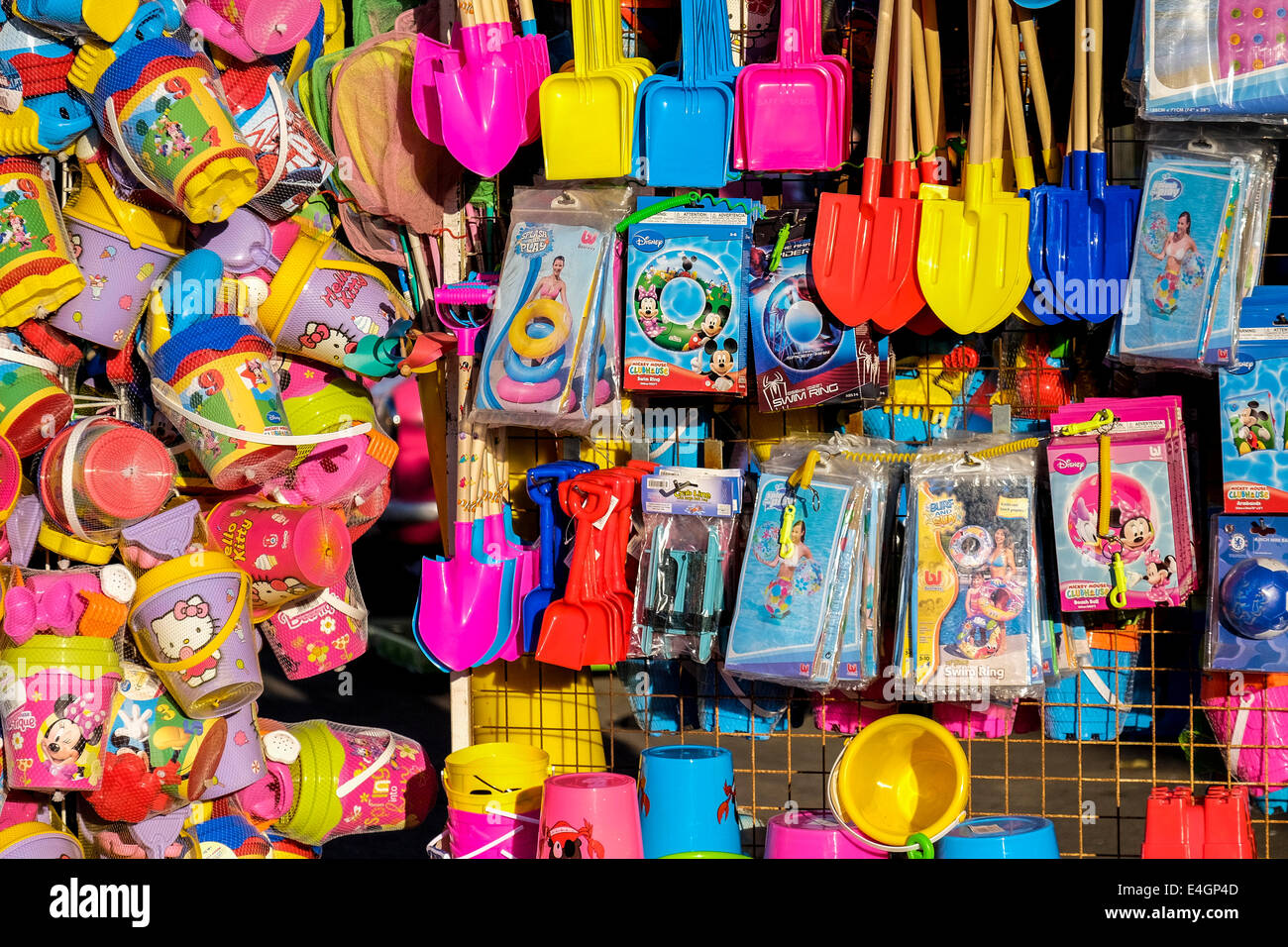 Colourful plastic beach novelties on sale Stock Photo Alamy