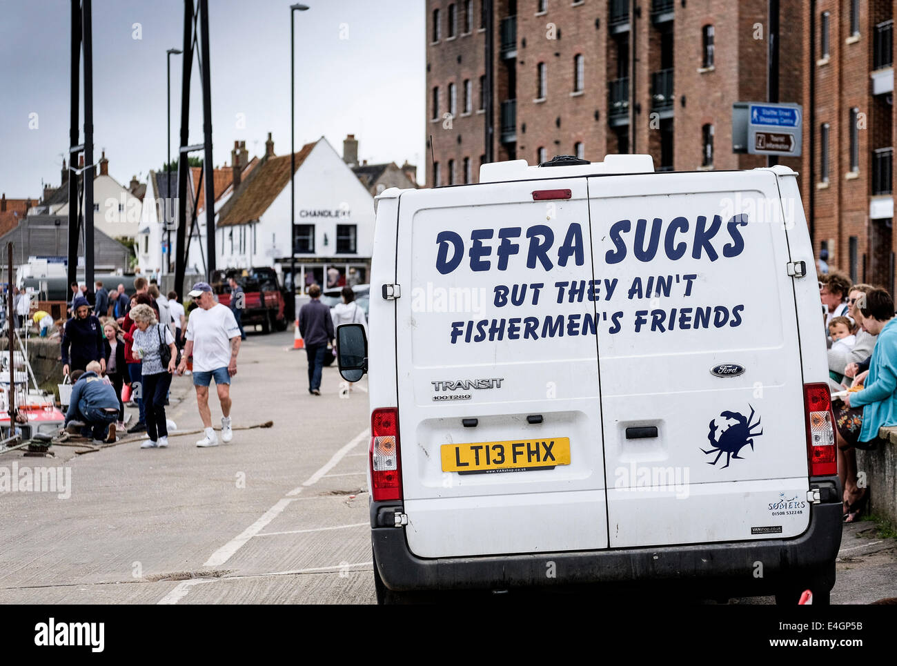 A slogan on the doors of a van parked on the quay at Wells Next the Sea. Stock Photo