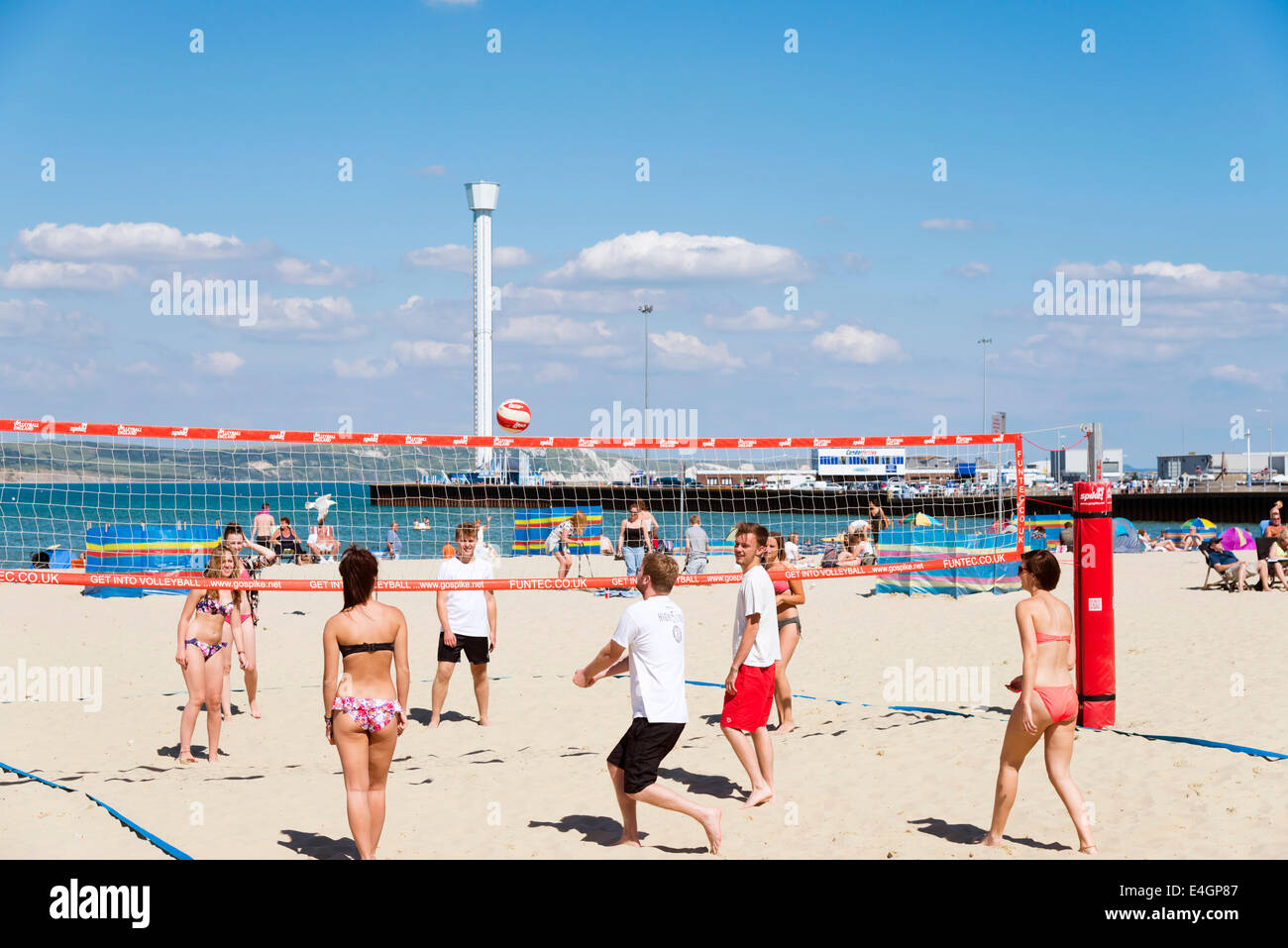 People playing beach volleyball at Weymouth, Dorset, UK. Stock Photo