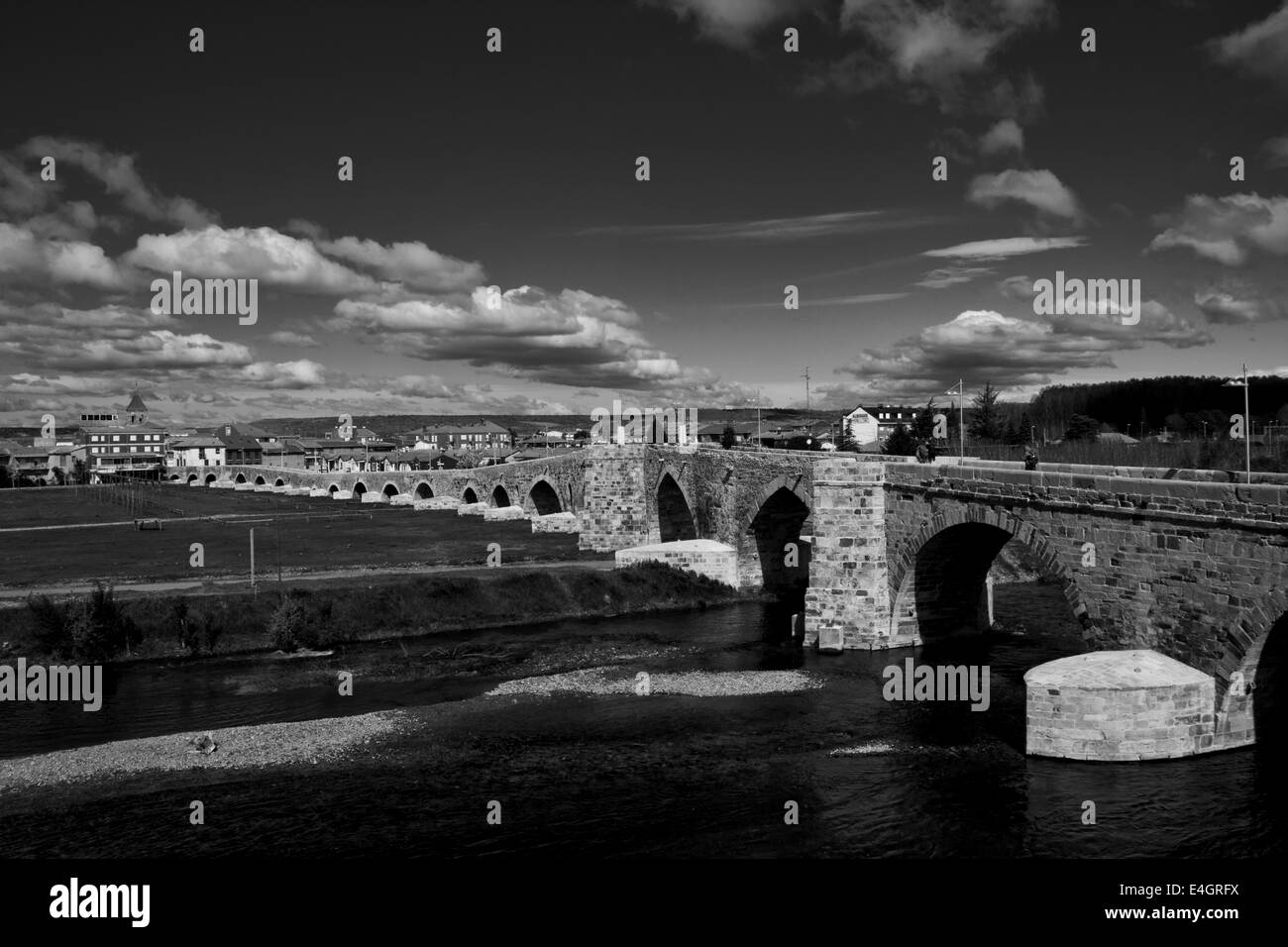 Bridge in Hospital de Orbigo on the great walk of St. James, Jakobsweg, Camino de Santiago, Spain, black and white Stock Photo