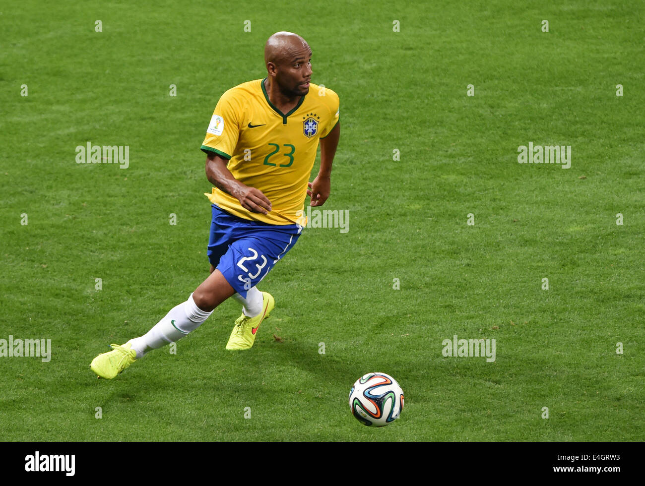 Brazil's Maicon controls the ball during the FIFA World Cup 2014 semi-final soccer match between Brazil and Germany at Estadio Mineirao in Belo Horizonte, Brazil, 08 July 2014. Photo: Andreas Gebert/dpa (RESTRICTIONS APPLY: Editorial Use Only, not used in association with any commercial entity - Images must not be used in any form of alert service or push service of any kind including via mobile alert services, downloads to mobile devices or MMS messaging - Images must appear as still images and must not emulate match action video footage - No alteration is made to, and no text or image is sup Stock Photo