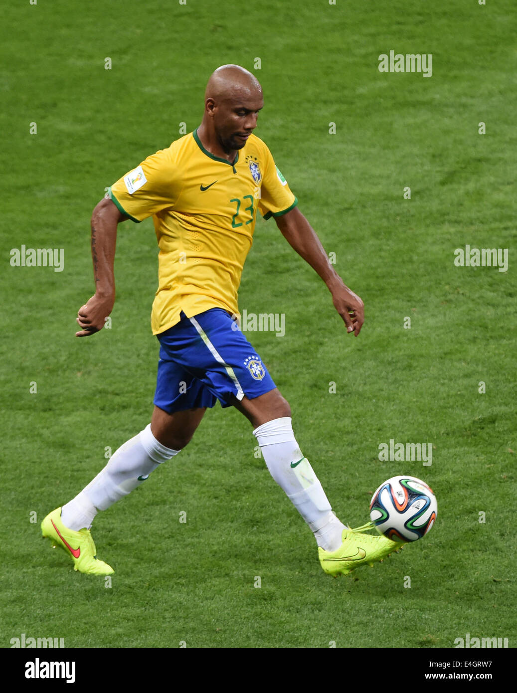 Brazil's Maicon controls the ball during the FIFA World Cup 2014 semi-final soccer match between Brazil and Germany at Estadio Mineirao in Belo Horizonte, Brazil, 08 July 2014. Photo: Andreas Gebert/dpa (RESTRICTIONS APPLY: Editorial Use Only, not used in association with any commercial entity - Images must not be used in any form of alert service or push service of any kind including via mobile alert services, downloads to mobile devices or MMS messaging - Images must appear as still images and must not emulate match action video footage - No alteration is made to, and no text or image is sup Stock Photo