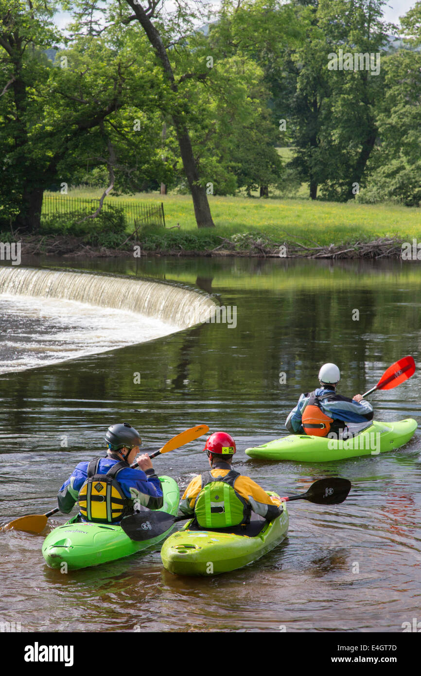 Kayaking on the River Dee near Horseshoe Falls, Llangollen, North Wales