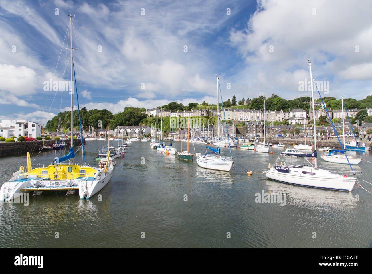 Sailing boats moored in Porthmadog Harbour, Gwynedd, North Wales Stock Photo