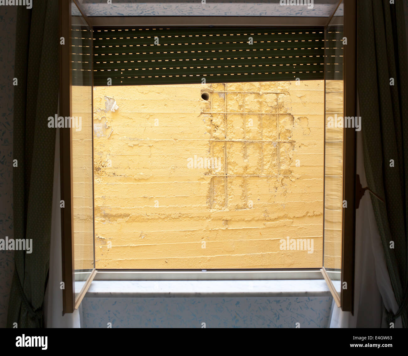 Hotel room with bad view on the wall. Stock Photo
