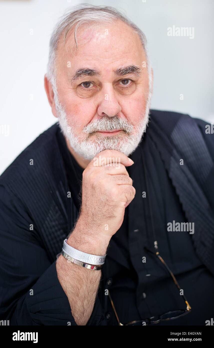 Berlin, Germany. 11th July, 2014. Celebrity hairdresser Udo Walz attends the Gala Fashion Brunch in the line of the Berlin Fashion Week in Berlin, Germany, 11 July 2014. The show runs from 08 to 11 July 2014. Photo: Daniel Naupold/dpa/Alamy Live News Stock Photo