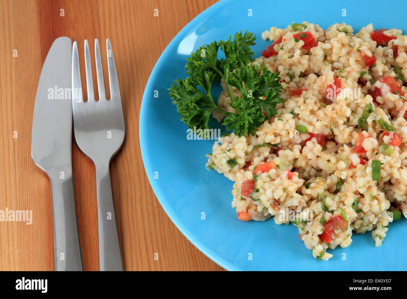 Traditional turkish salad with bulgur, tomatoes and parsley Stock Photo
