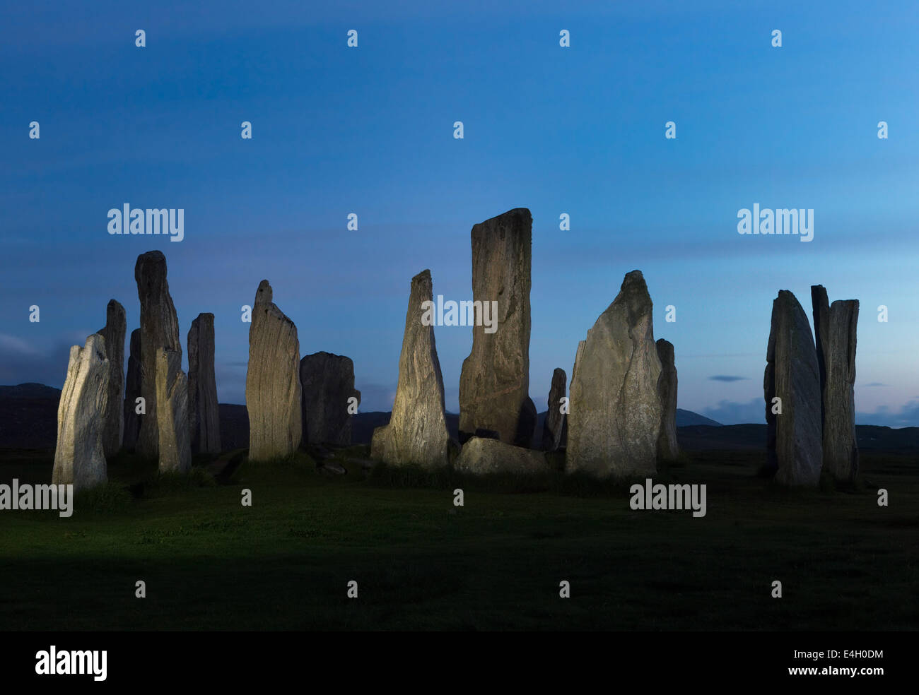 Megalithic stone circle of 3000 bc on the Isle of Lewis and Harris, Outer Hebrides, Scotland, at midnight in June, when it does Stock Photo