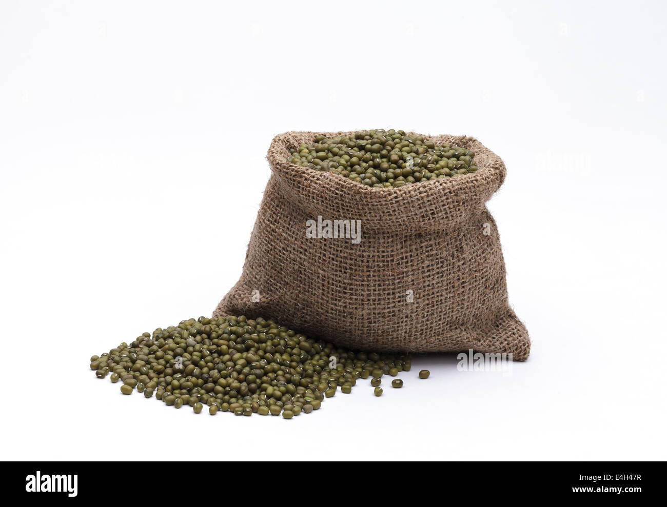 Green peas arrange and in the sack isolated on white background Stock Photo