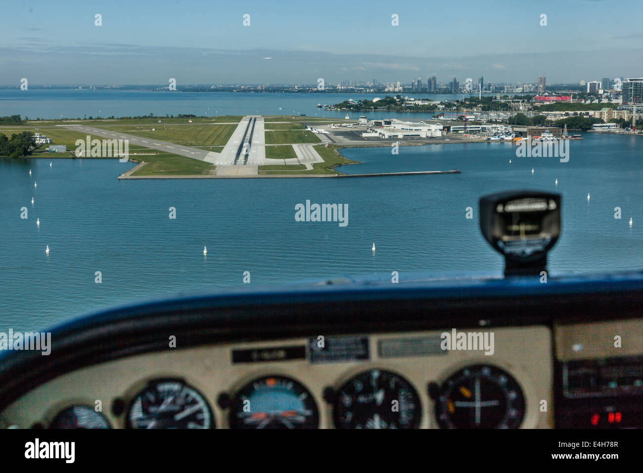 Cockpit view of Billy Bishop Airport on final approach for landing. Stock Photo