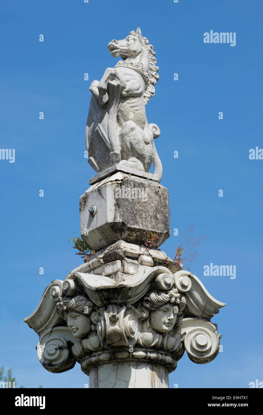 Unicorn at top of free-standing Ionic column at axis of park walkways in Springburn Park Glasgow Stock Photo