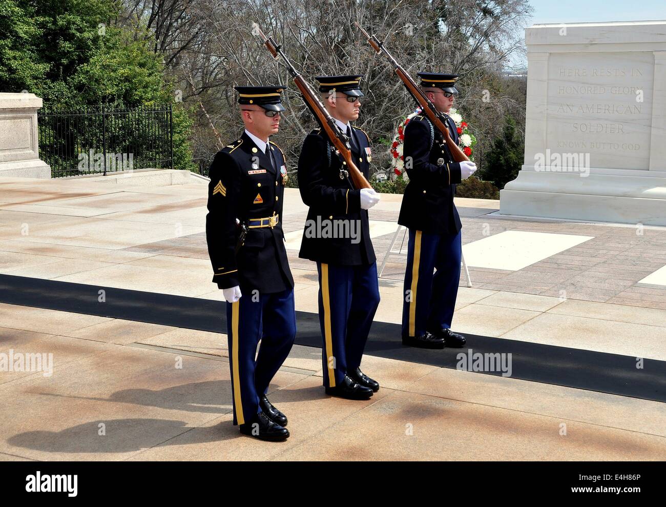 Arlington, Virginia:  Three United States Marines perform the changing of the guard ceremony at the Tomb of the Unknown Soldier Stock Photo