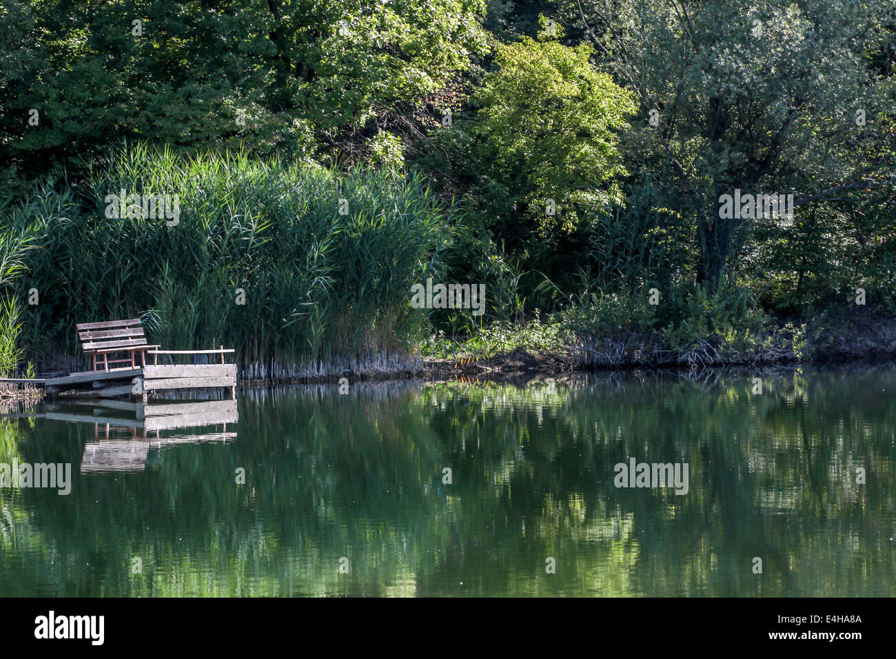 view of fishing stands on a tranquil lake Stock Photo