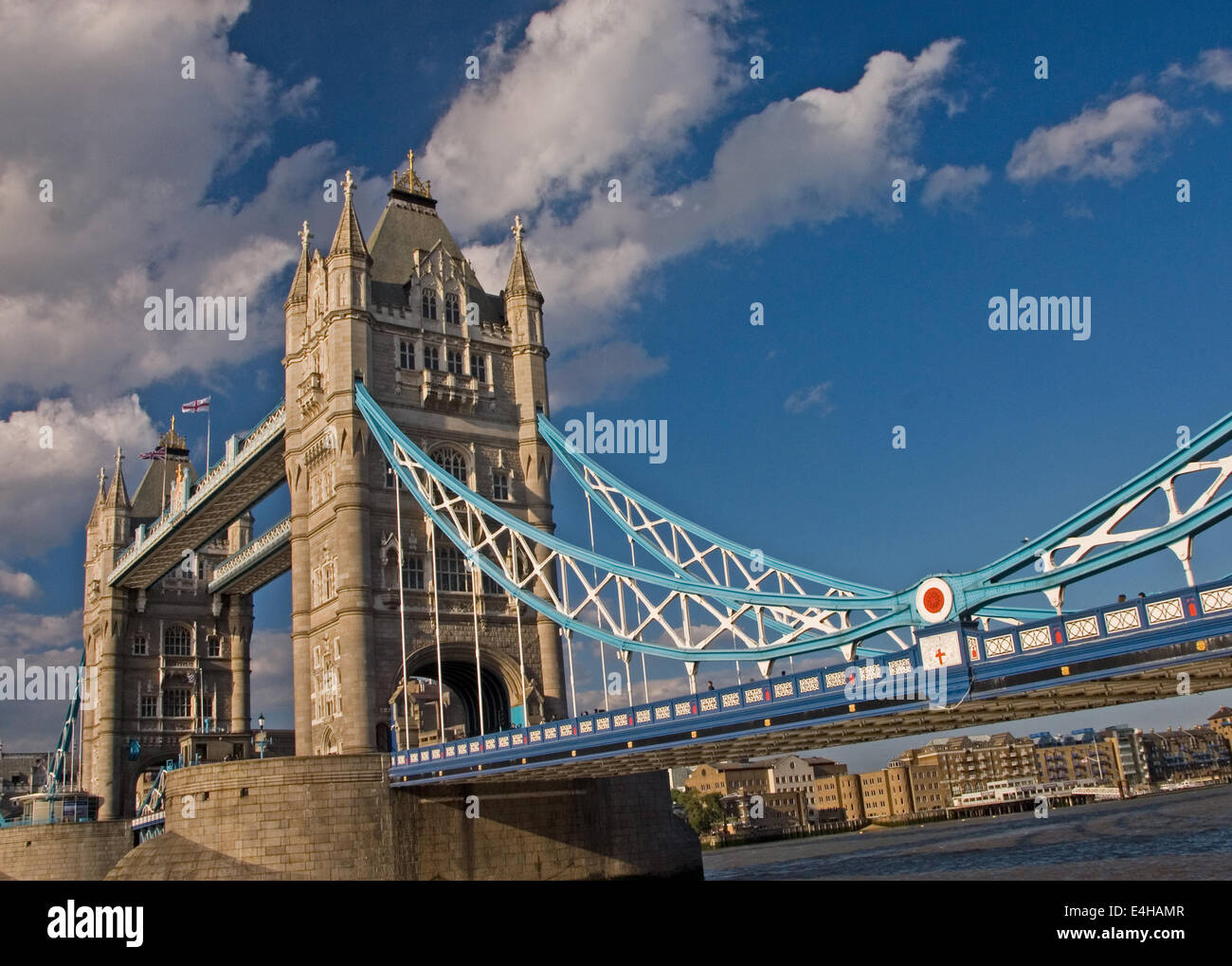 Tower Bridge across the River Thames in London is an iconic Bascule Bridge and marks the start of the Pool of London. Stock Photo