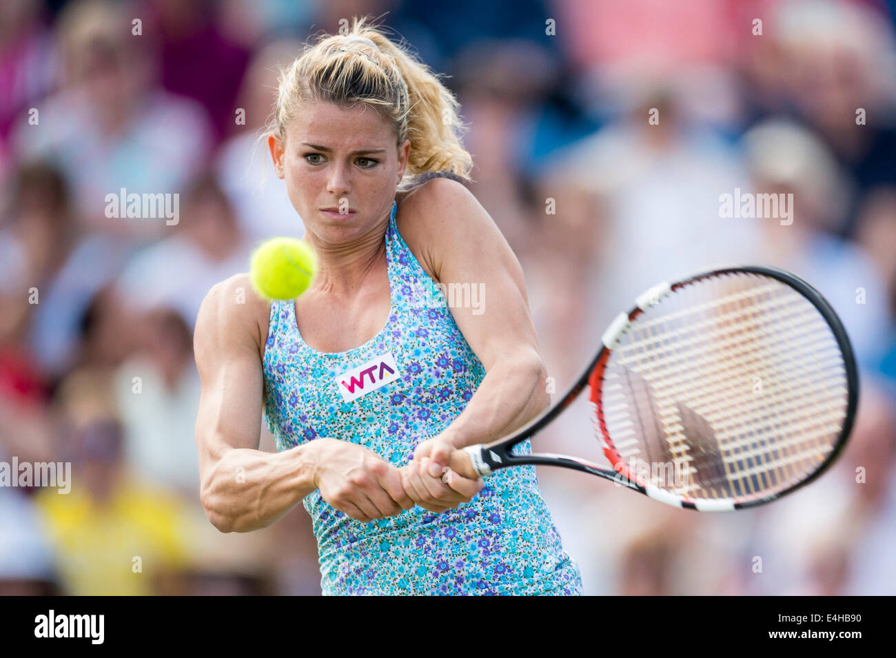 Camila Giorgi - AEGON International 2014- Eastbourne - England,  Camila Giorgi of Italy in action playing two handed backhand Stock Photo