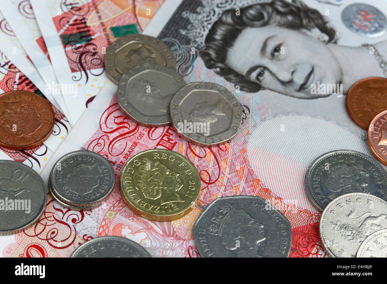Uk sterling money notes and coins for business Stock Photo - Alamy