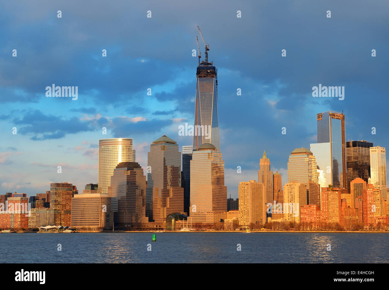 Downtown Manhattan skyline at sunset over Hudson River in New York City ...