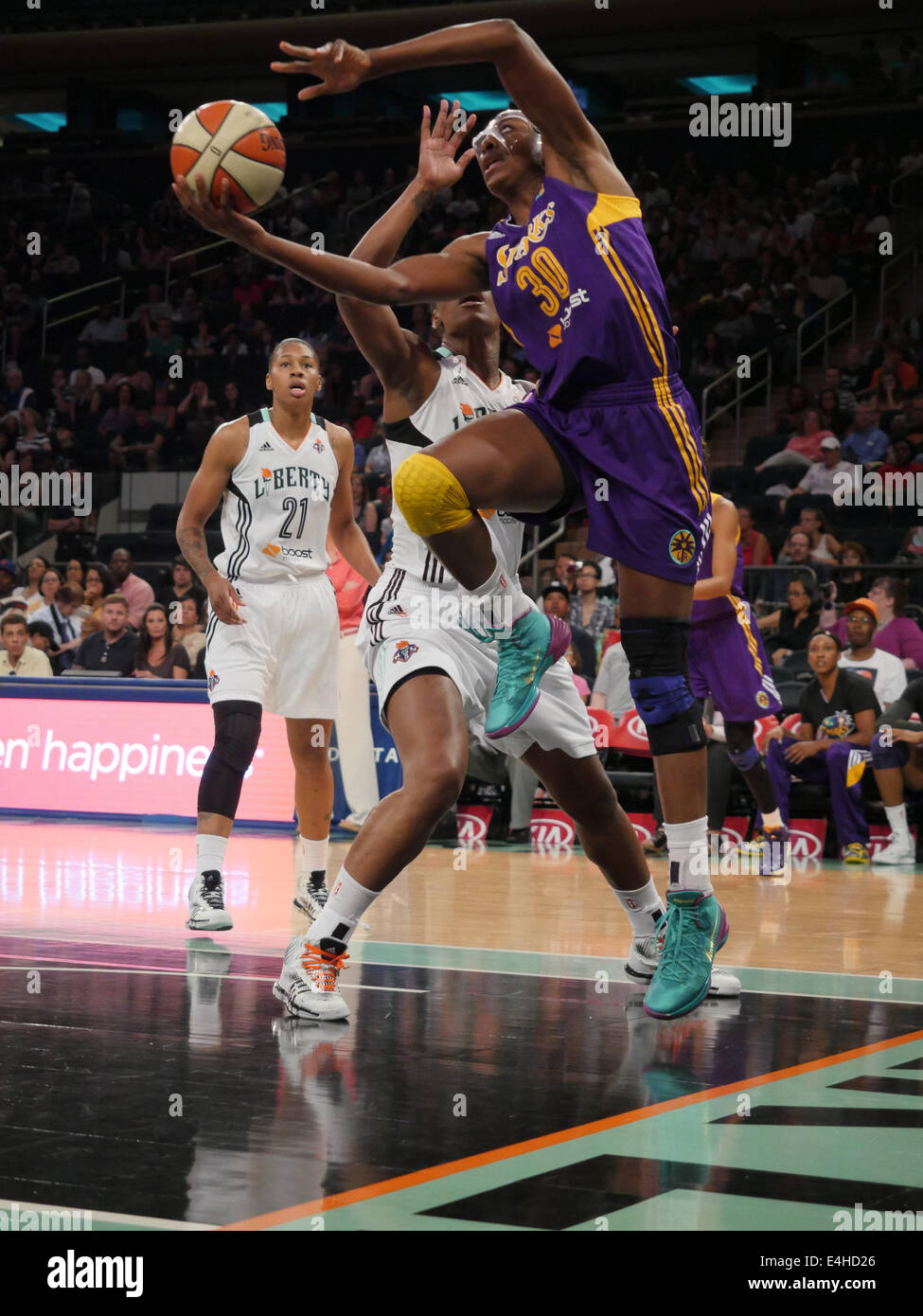 New York City, New Jersey, USA. 11th July, 2014. Los Angeles Sparks forward, NNEKA OGWUMIKE (30), drives to the basket against New York in a game at Madison Square Garden in New York City. © Joel Plummer/ZUMA Wire/Alamy Live News Stock Photo
