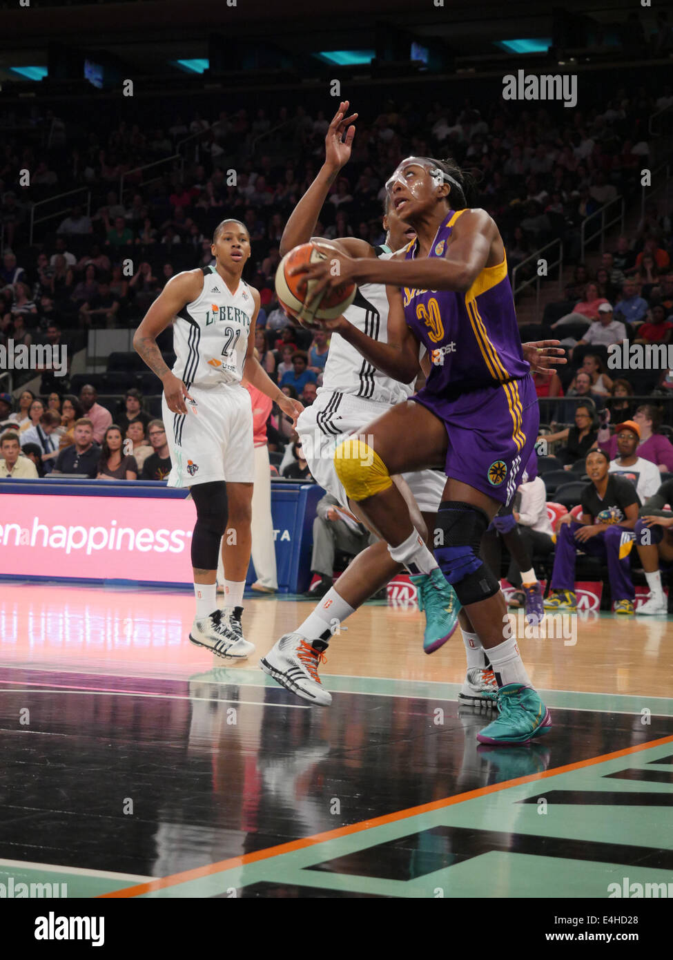 New York City, New Jersey, USA. 11th July, 2014. Los Angeles Sparks forward, NNEKA OGWUMIKE (30), drives to the basket against New York in a game at Madison Square Garden in New York City. © Joel Plummer/ZUMA Wire/Alamy Live News Stock Photo