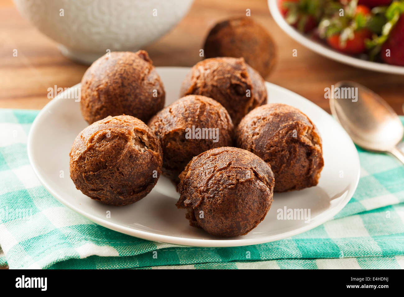 Homemade Chocolate Donut Holes with Sugar for Breakfast Stock Photo