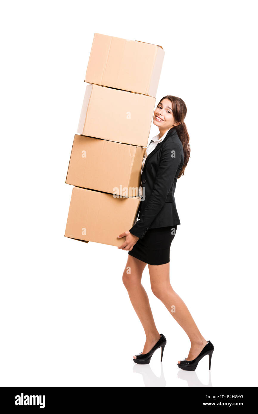 Business woman carrying card boxes, isolated over white background Stock Photo