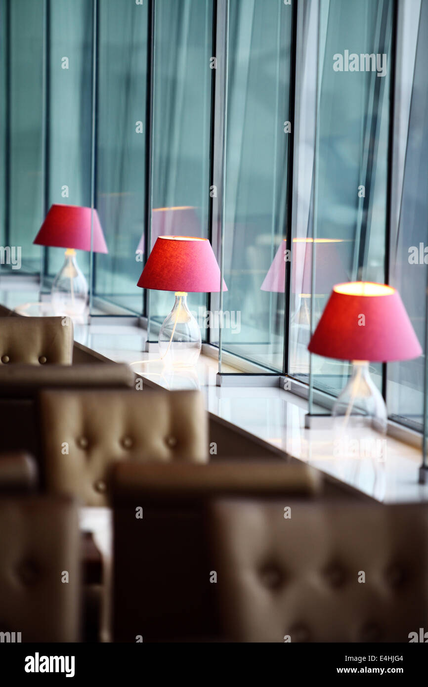 Interior with some lamps and tall windows Stock Photo Alamy