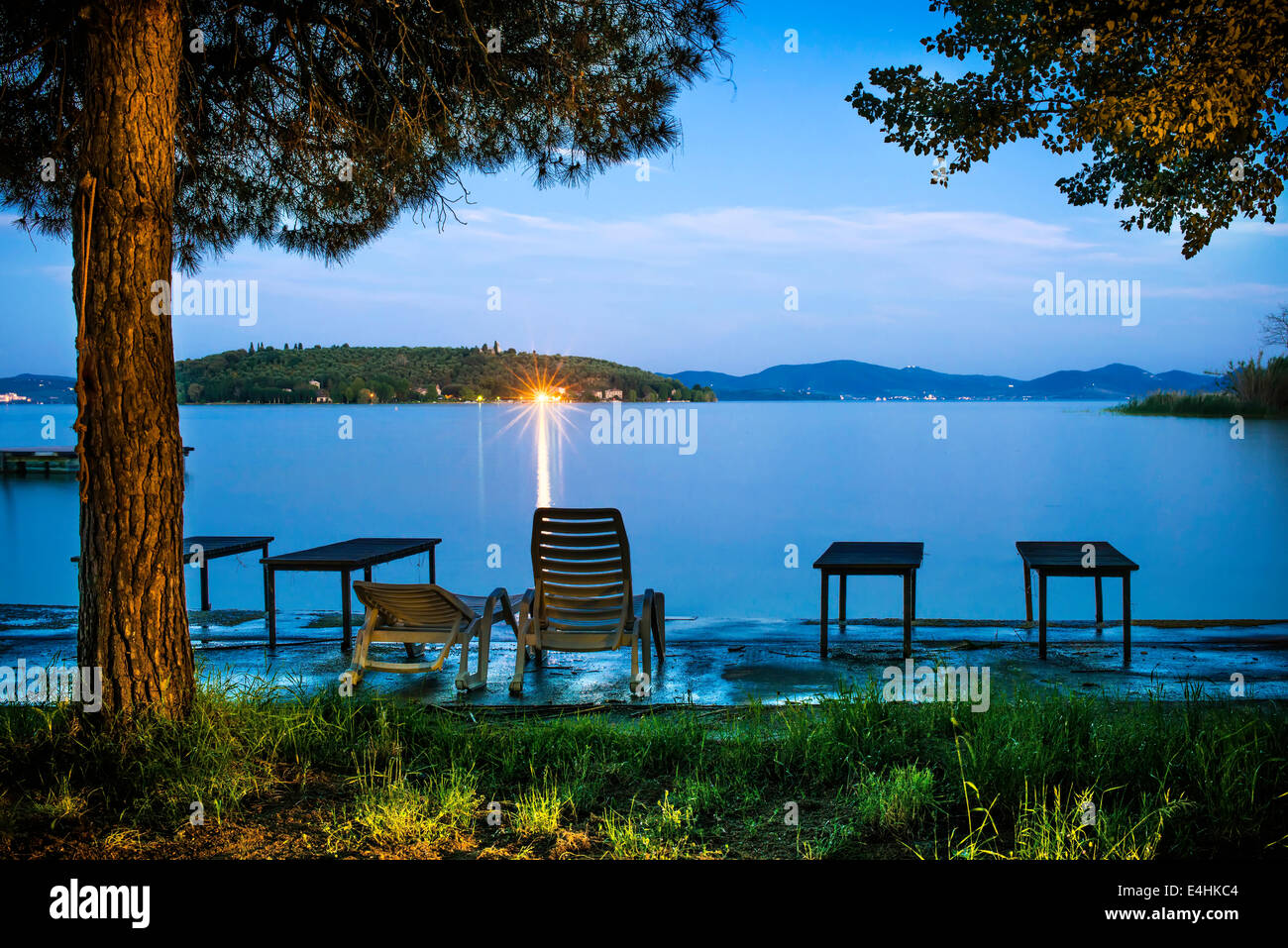 Morning on the shore of a mountain lake. Sunrise Stock Photo - Alamy