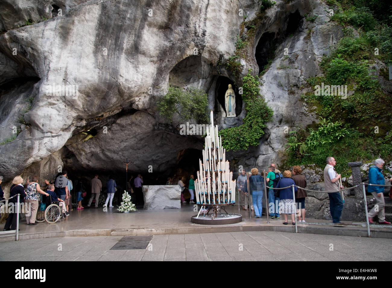 Statue of the Virgin Mary in the grotto of Lourdes Stock Photo - Alamy