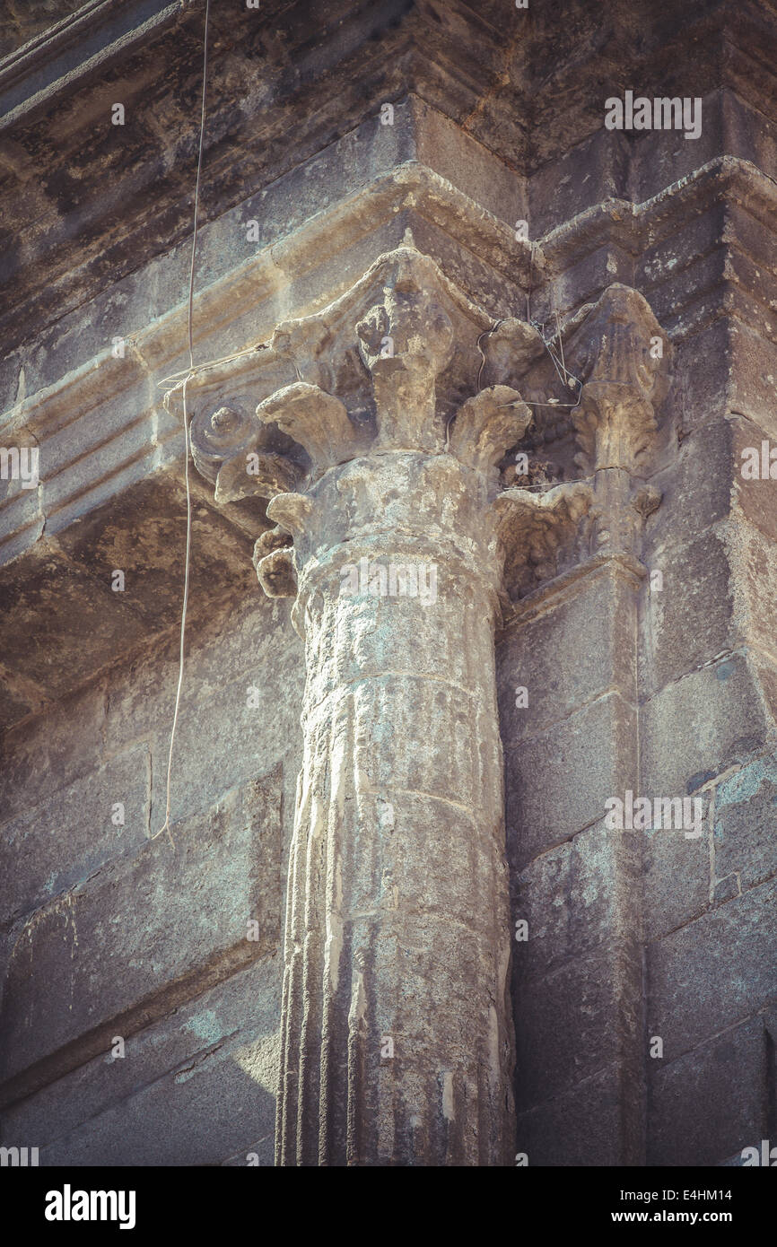 Antique, Corinthian capitals, stone columns in old building in Spain