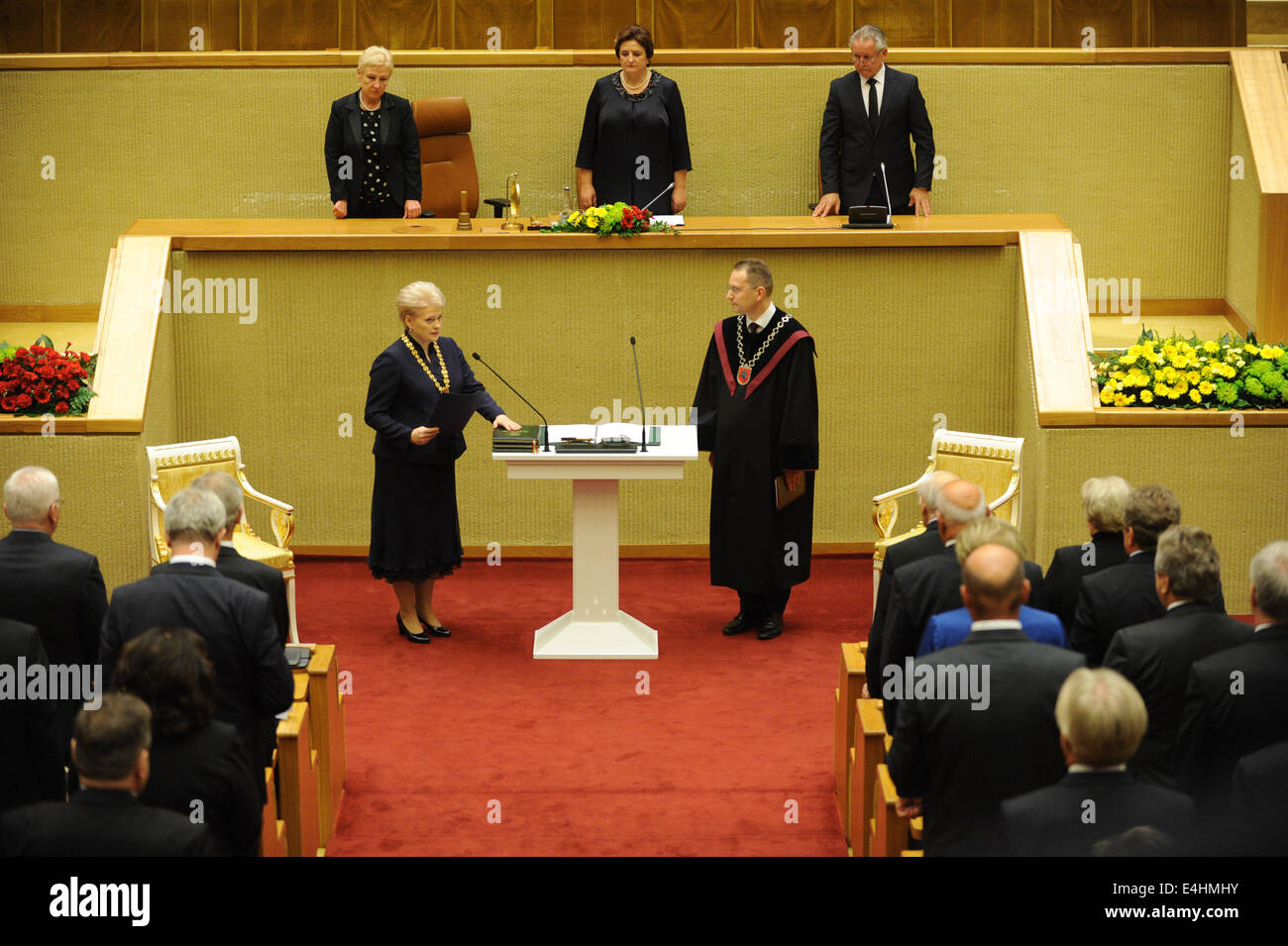 Vilnius, Lithuania. 12th July, 2014. Dalia Grybauskaite (L1) takes an oath on her inauguration of presidency in Vilnius, Lithuania, on July 12, 2014. Grybauskaite was reelected president of Lithuania in May with roughly 58 percent of supportive votes, making her the first president of the Baltic country to be consecutively elected. Credit:  Alfredas Pliadis/Xinhua/Alamy Live News Stock Photo