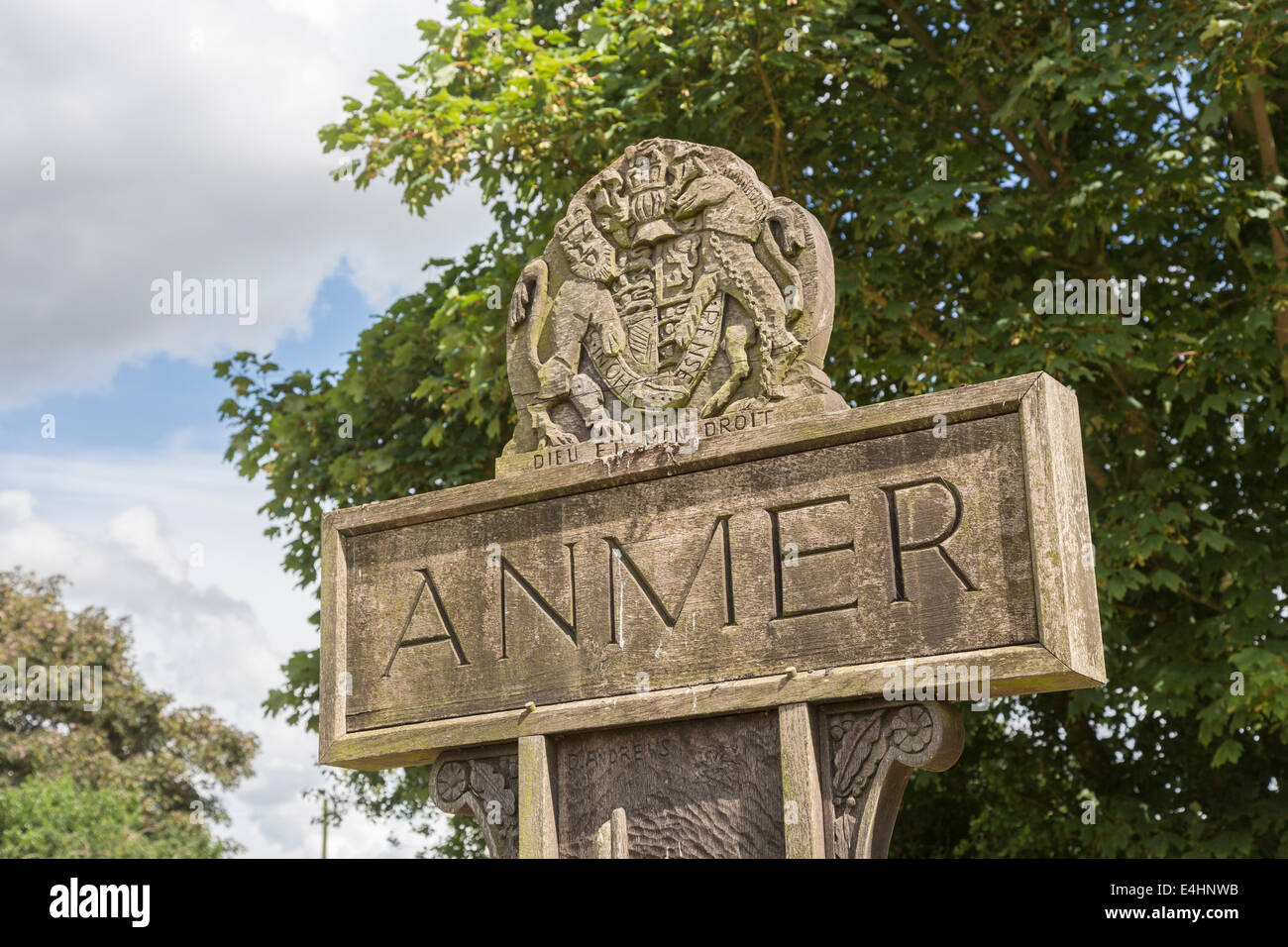 Wooden place name sign with the name of the village of Anmer, near Sandringham, Norfolk, UK, home of the Duke and Duchess of Cambridge Stock Photo