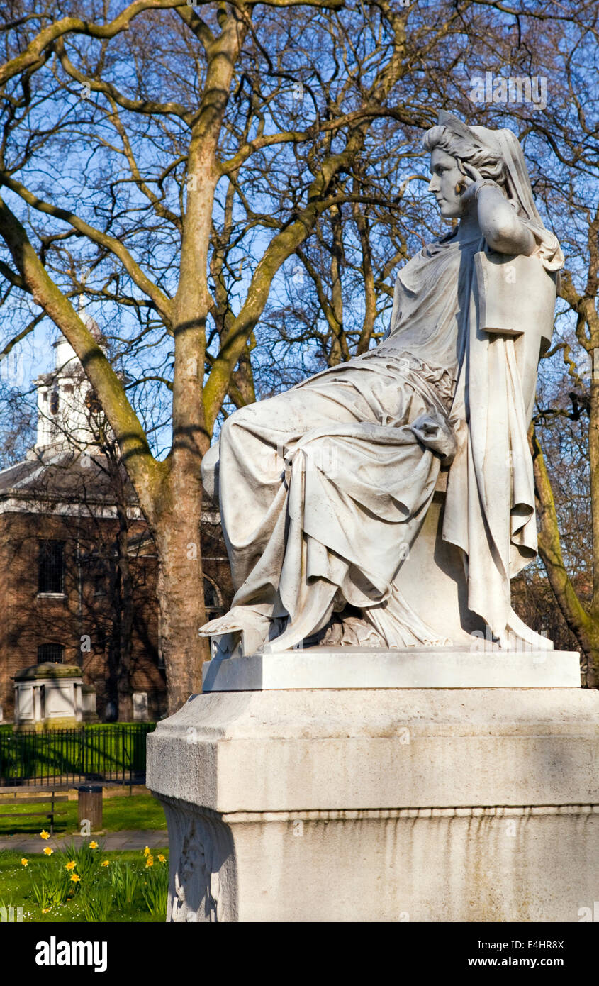 Sarah Siddons statue on Paddington Green with St.Mary's Church in the