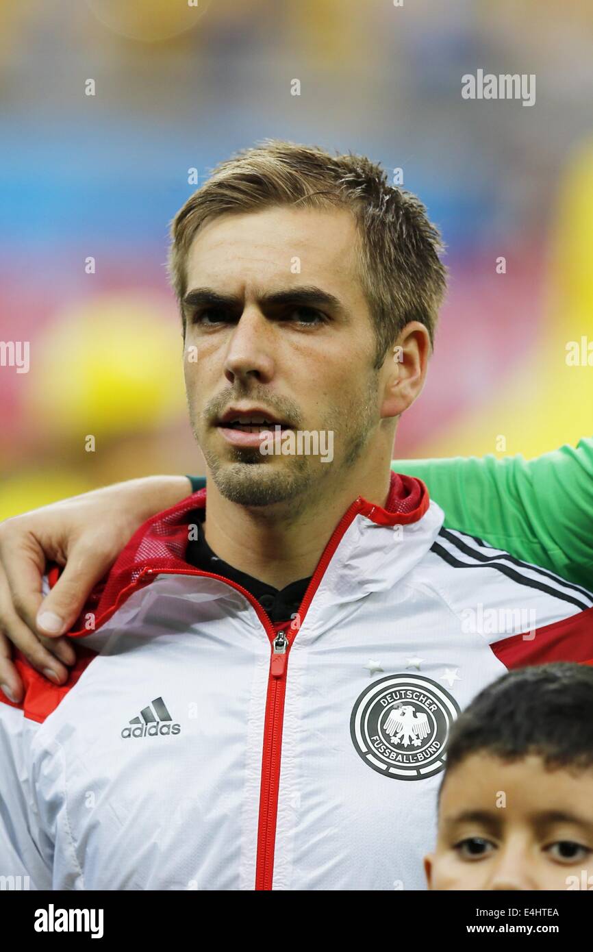 RIO DE JANEIRO, BRAZIL - JULY 13: Philipp Lahm of Germany lifts the World  Cup trophy to celebrate with his team…