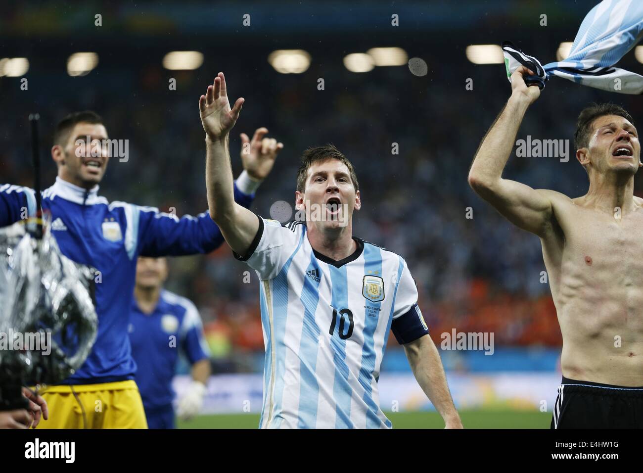 (L-R) Mariano Andujar, Lionel Messi, Martin Demichelis (ARG), JULY 9, 2014 - Football / Soccer : Argentina team group celebrate after winning the penalty shoot out during the FIFA World Cup 2014 semi-final match between Netherlands 0(2-4)0 Argentina at Arena De Sao Paulo Stadium in Sao Paulo, Brazil. (Photo by AFLO) [3604] Stock Photo
