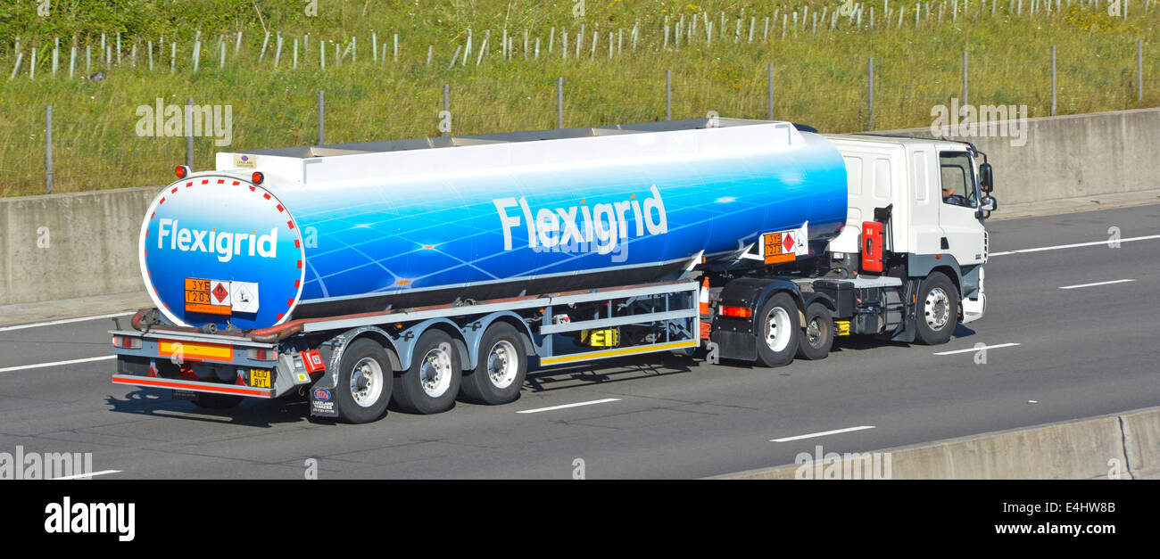 Hgv commercial lorry truck vehicle fuel delivery articulated tanker Flexigrid livery (part of Greenergy company) with Hazchem information plates Stock Photo