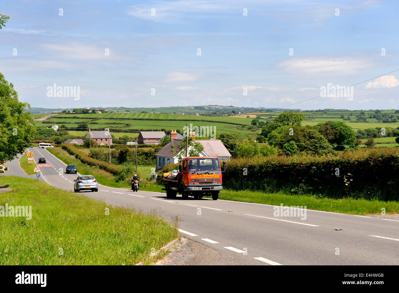 'A' road through rural countryside, junction B4582 and A487, Wales, UK Stock Photo