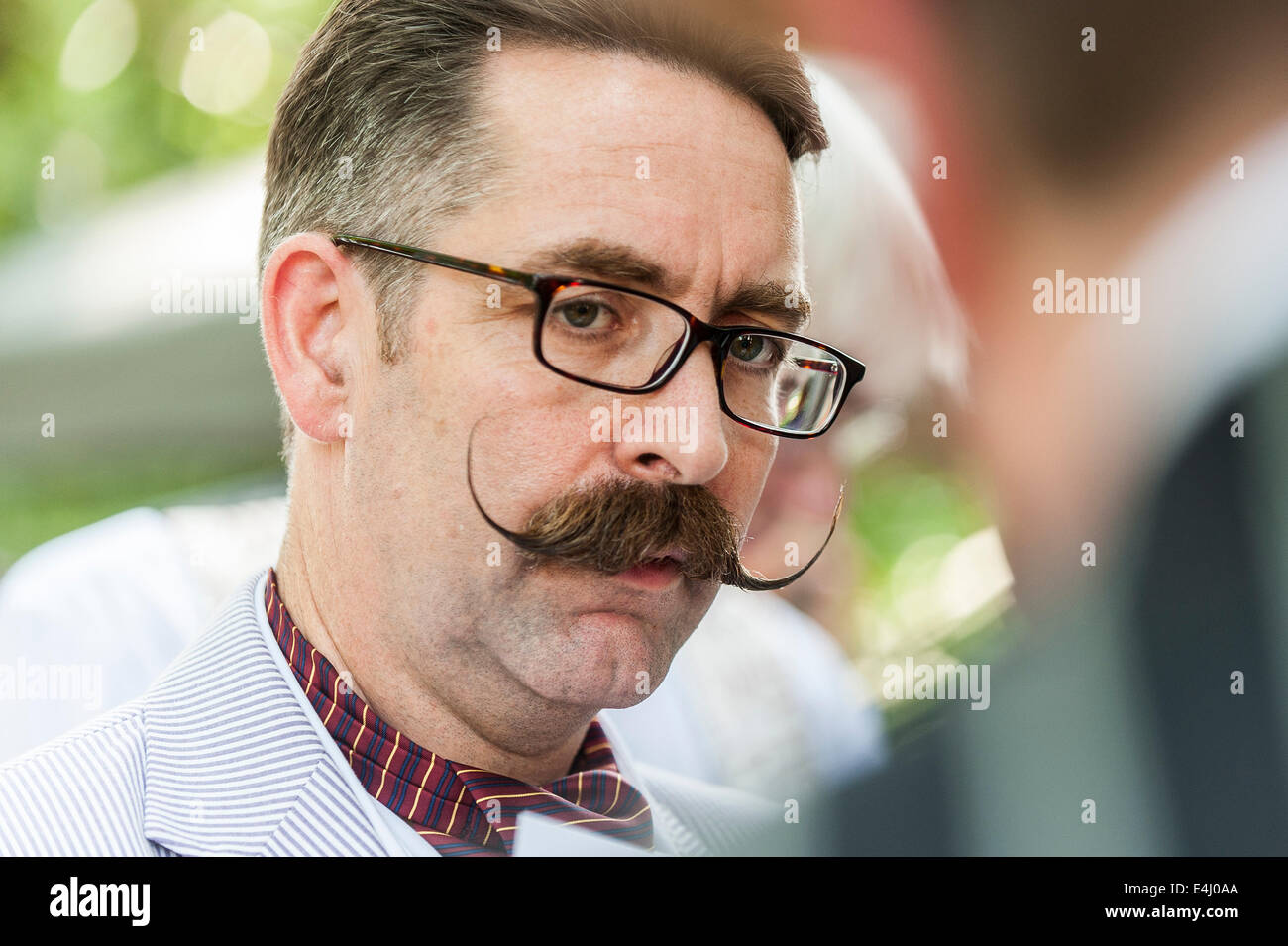 Bedford Square, Bloomsbury, London, 19th April 2014.  A chap sports a superbly waxed moustache at the 10th Anniversay of the Chap Olympiad celebrations. Photographer;  Gordon Scammell/Alamy Live News Stock Photo