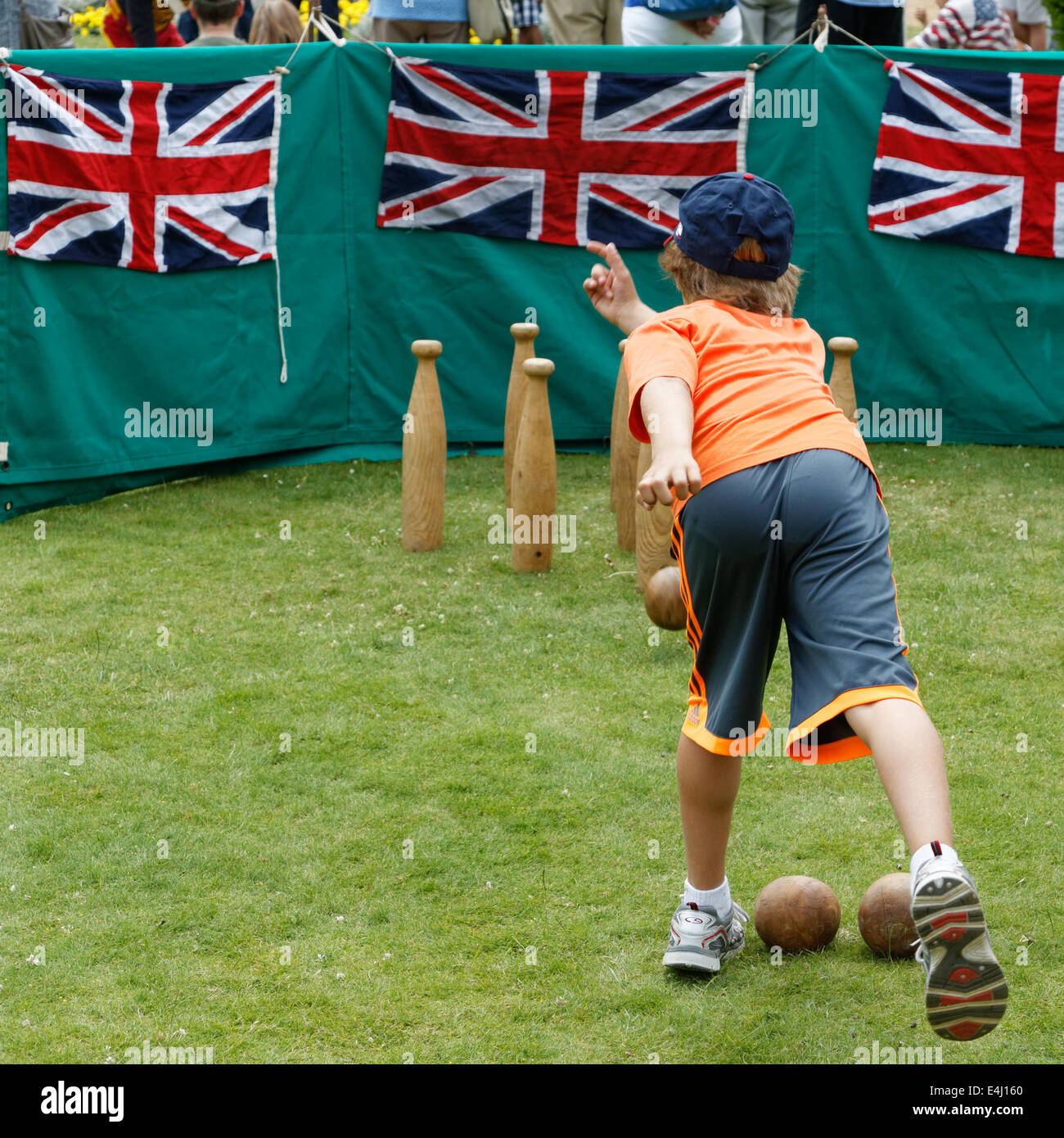 Children playing skittles at Hughenden Manor Stock Photo