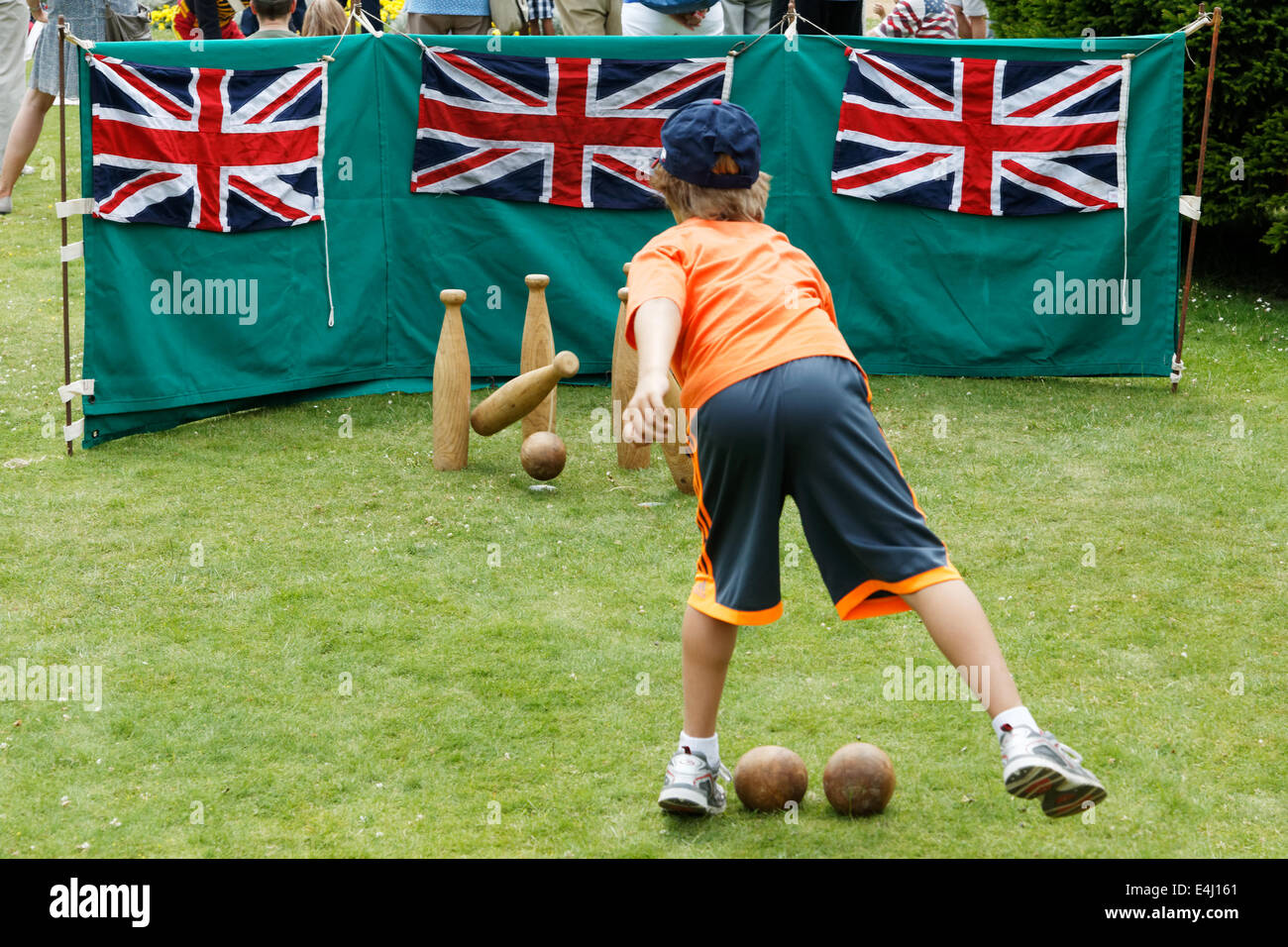 Children playing skittles at Hughenden Manor Stock Photo