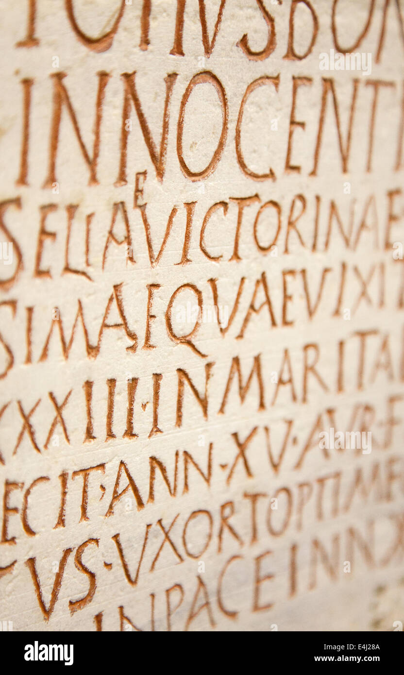 Pre-christian latin writing carved on the tombstone Stock Photo