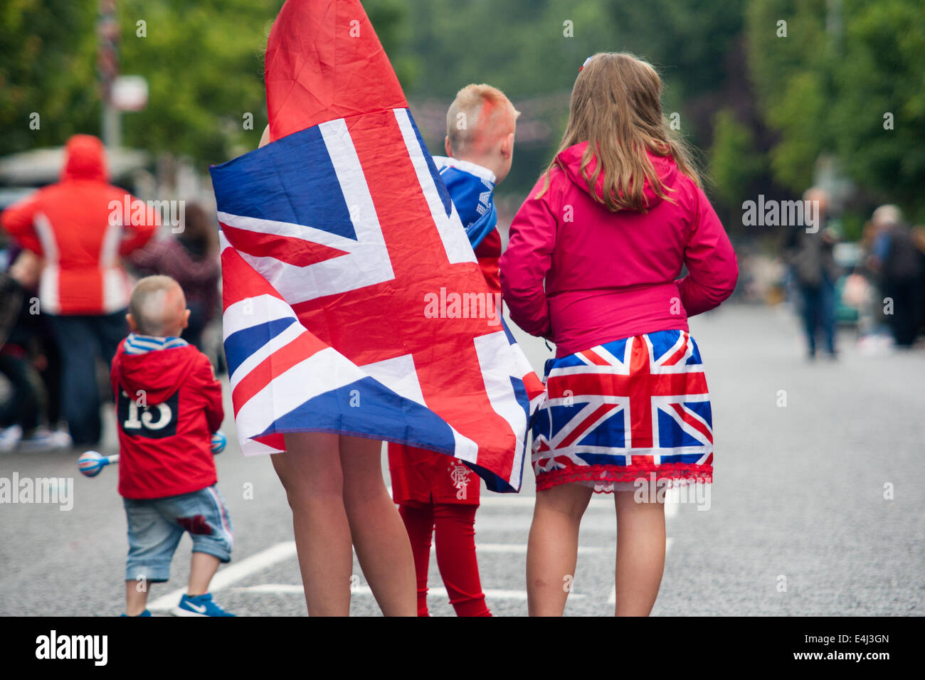 Young children draped in the union flag Stock Photo