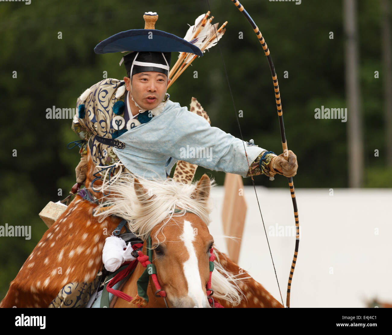 Samurai shooting his arrow in the traditional Japanese Yabusame