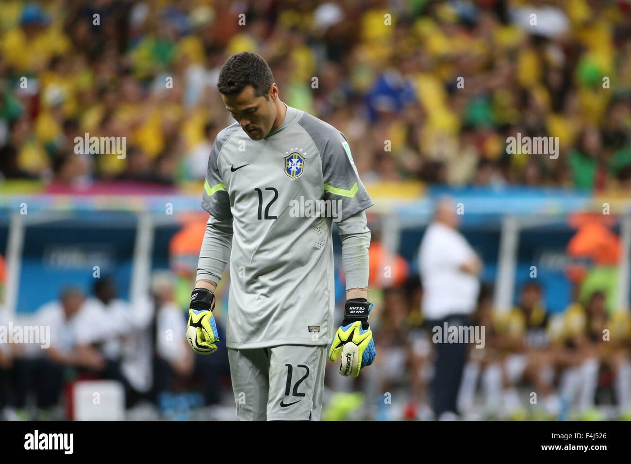 Brasilia, Brazil. 12th July, 2014. Brazil's goalkeeper Julio Cesar reacts during the third place play-off match between Brazil and Netherlands of 2014 FIFA World Cup at the Estadio Nacional Stadium in Brasilia, Brazil, on July 12, 2014. Credit:  Yang Lei/Xinhua/Alamy Live News Stock Photo
