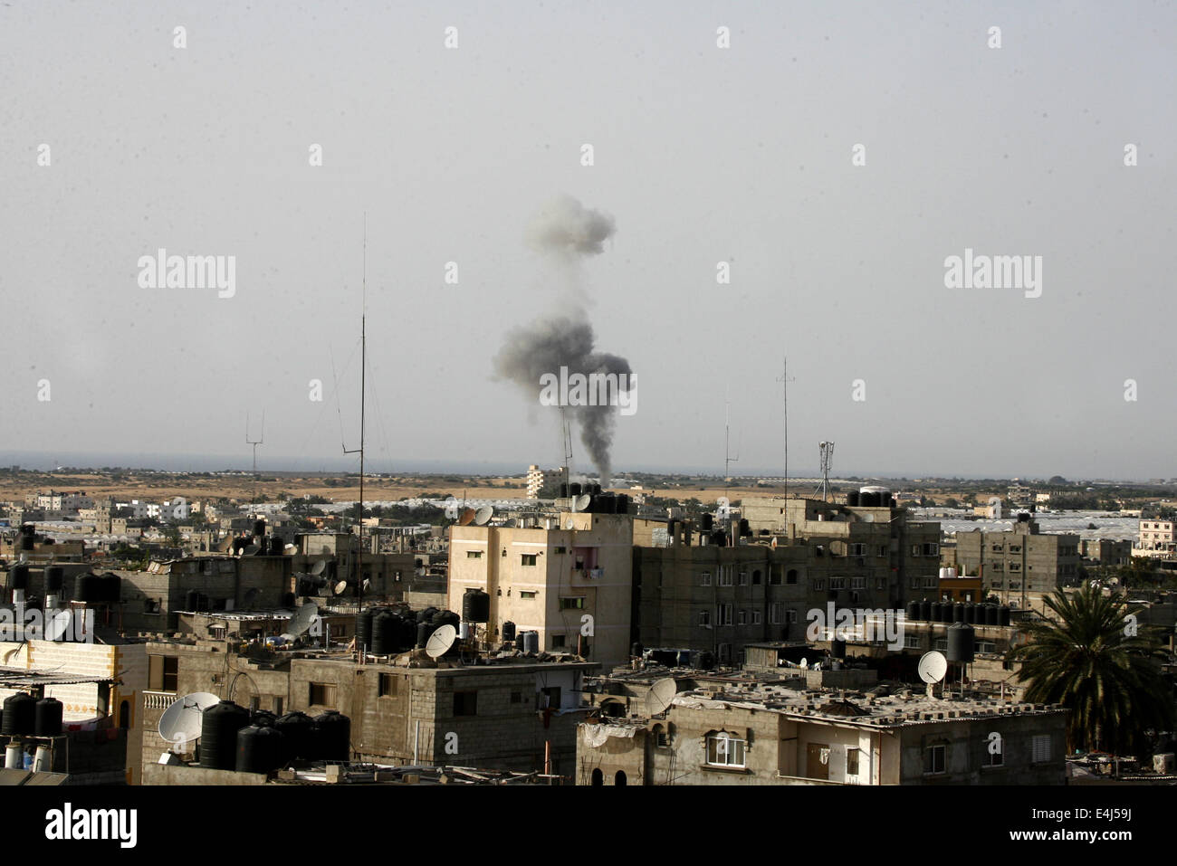 Gaza, Gaza Strip, Palestinian Territories. 12th July, 2014. Smoke rises