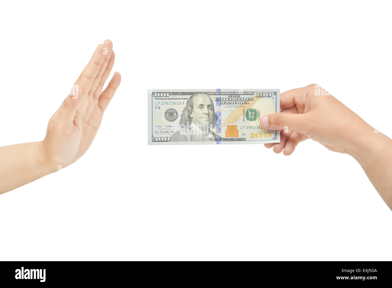 A hand's gesture for refusing bribe. Do not want money. Stock Photo
