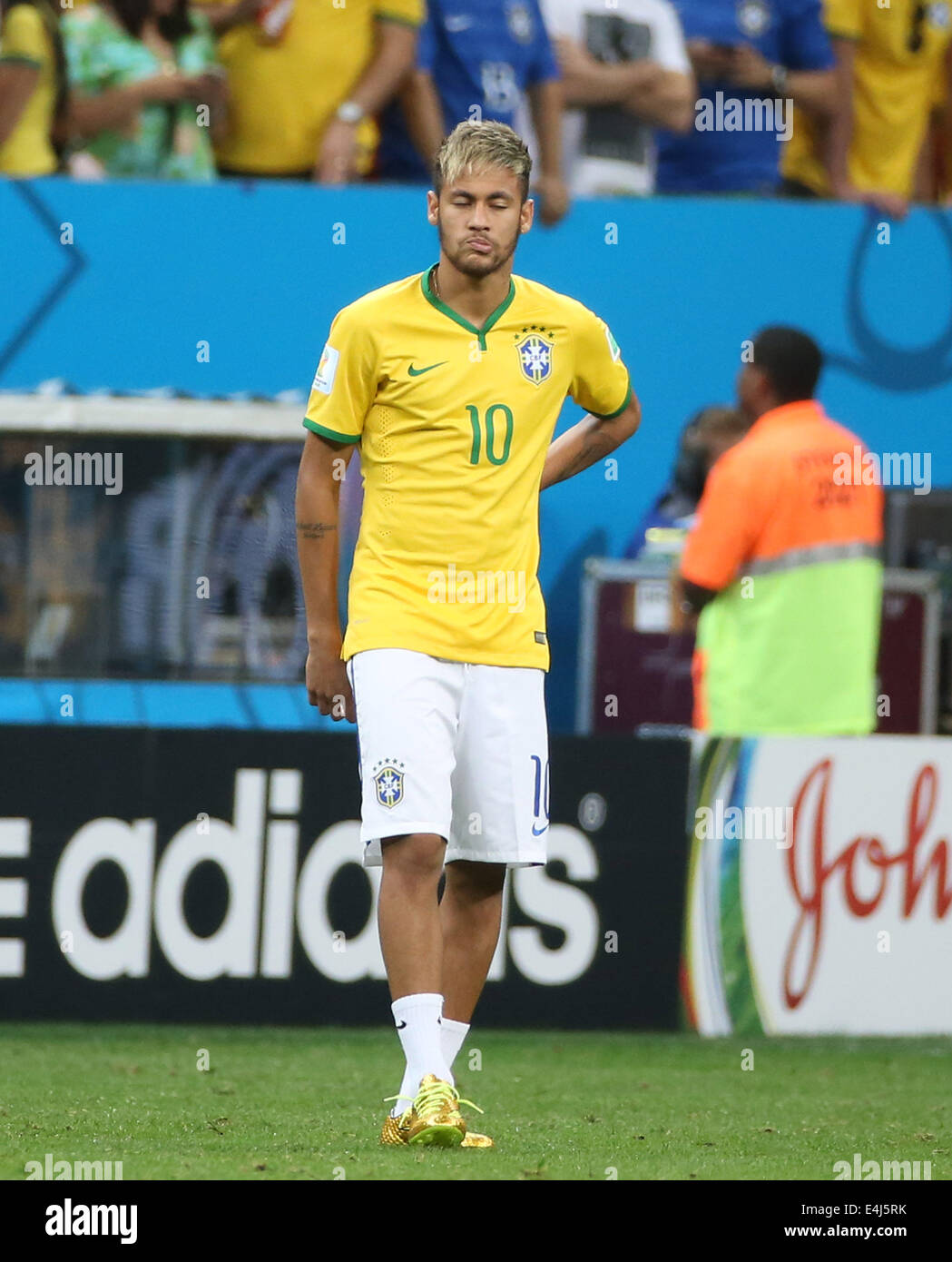 Brasilia, Brazil. 12th July, 2014. Brazil's Neymar reacts after the third place play-off match between Brazil and Netherlands of 2014 FIFA World Cup at the Estadio Nacional Stadium in Brasilia, Brazil, on July 12, 2014. Netherlands won 3-0 over Brazil and took the third place of the tournament on Saturday. Credit:  Cao Can/Xinhua/Alamy Live News Stock Photo