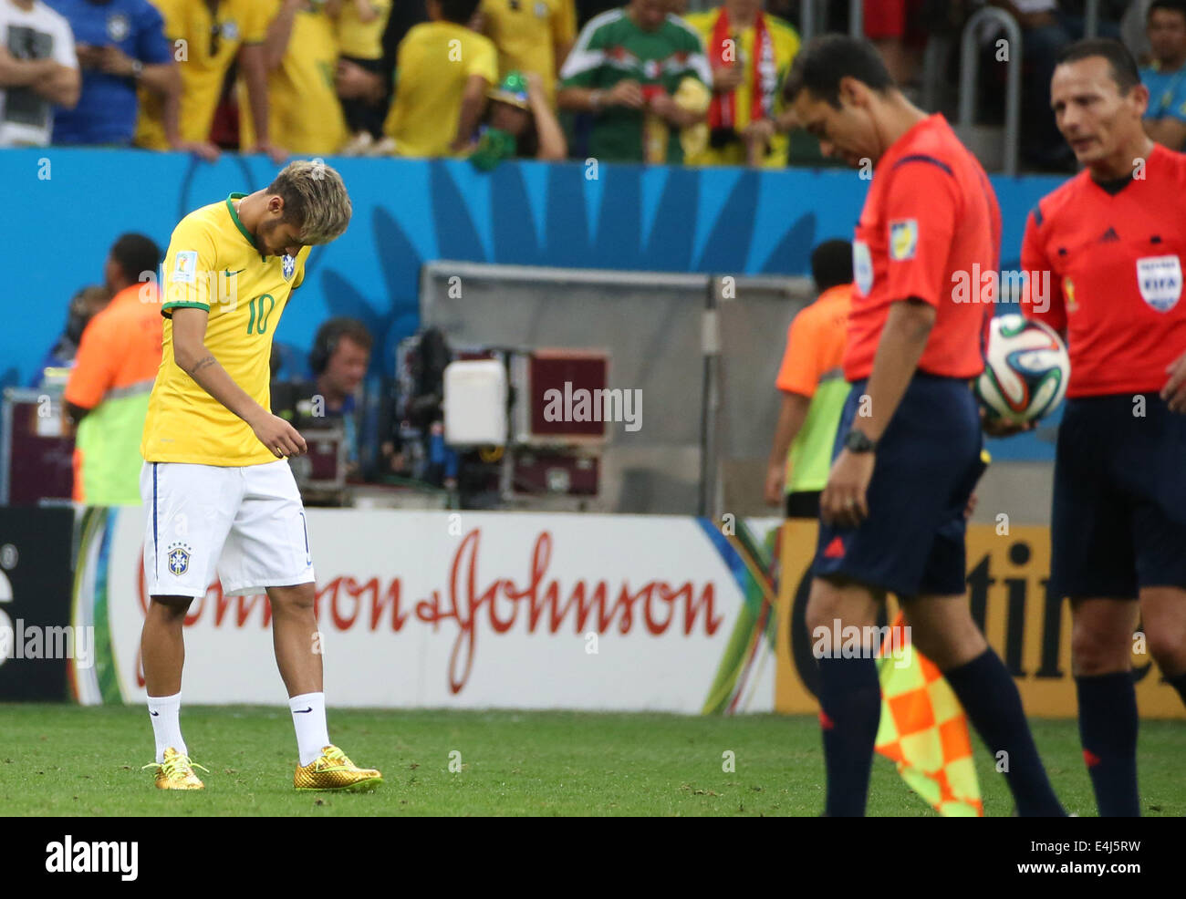 Brasilia, Brazil. 12th July, 2014. Brazil's Neymar (L) reacts after the third place play-off match between Brazil and Netherlands of 2014 FIFA World Cup at the Estadio Nacional Stadium in Brasilia, Brazil, on July 12, 2014. Netherlands won 3-0 over Brazil and took the third place of the tournament on Saturday. Credit:  Cao Can/Xinhua/Alamy Live News Stock Photo